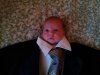 baby-wearing-suit-tiny-head-too-big-14000207060.jpg